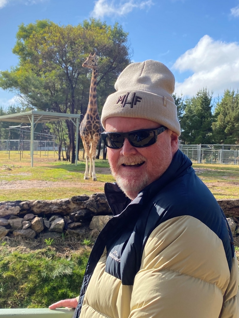 Bob smiling at the zoo