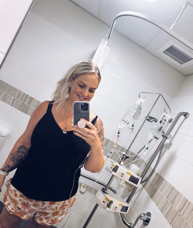 Vivienne takes a selfie while getting treatment.